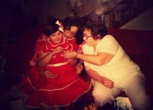 This is my mom, grandma, and myself when I was about 3 or 4. The dress I'm wearing had little bells underneath the skirt and I LOVED to tinkle everywhere where I walked! Wait...